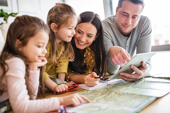 Family reading a map 
